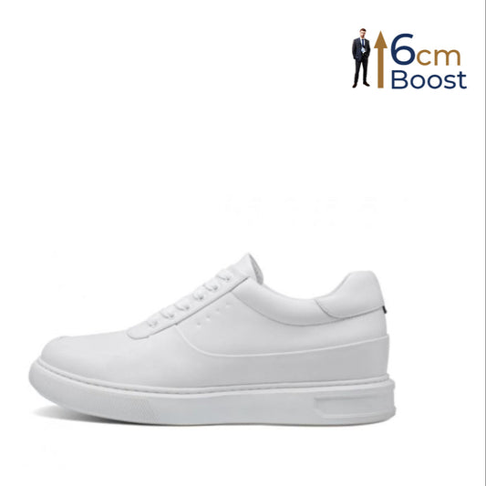 A white, low-top leather sneaker with a boosting sole designed to add height.