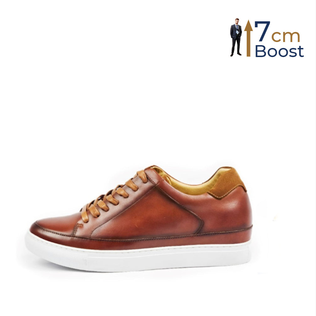 A tan brown casual style low-top sneaker with lace-up closure and a white sole, indicating a 7 cm height boost feature.